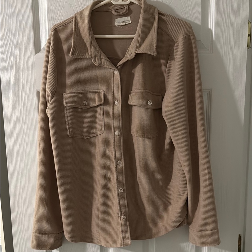 Tan woman’s button up